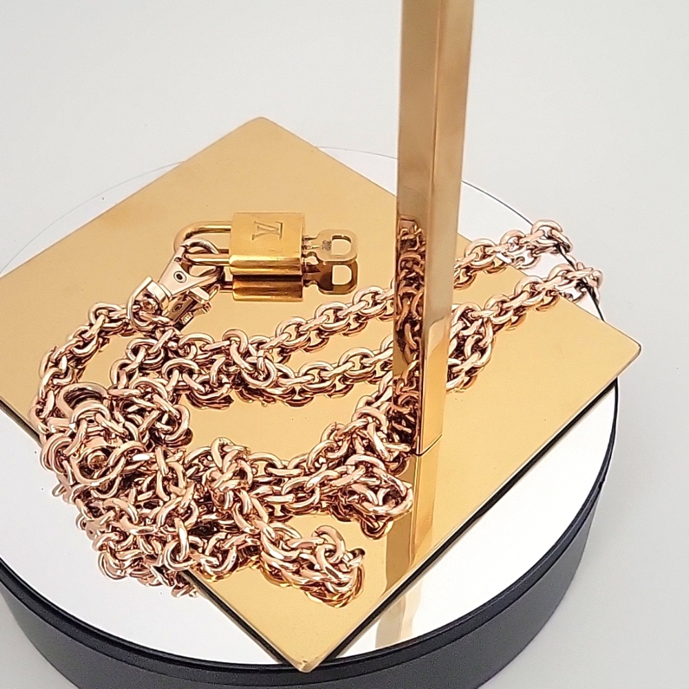 Authentic Louis Vuitton lock and key with chain